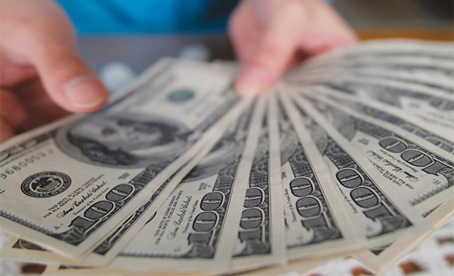 HSBC: Đến cuối năm NHNN có thể phá giá thêm 2% do áp lực từ Nhân dân tệ