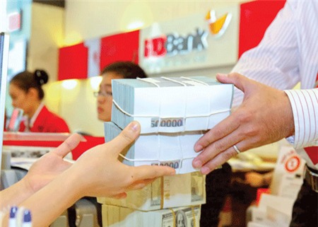 Chưa hết lo tỷ giá và nợ xấu