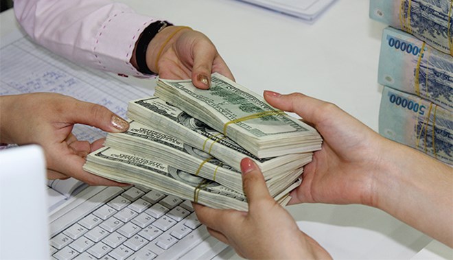 Phá giá đồng Việt Nam, bao nhiêu là đủ?