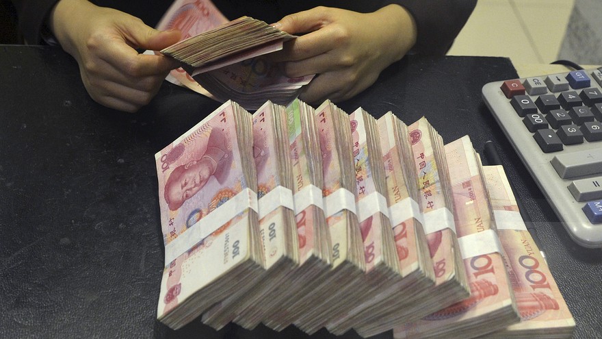 Trung Quốc đau đầu giữa tăng trưởng kinh tế và duy trì tỷ giá 