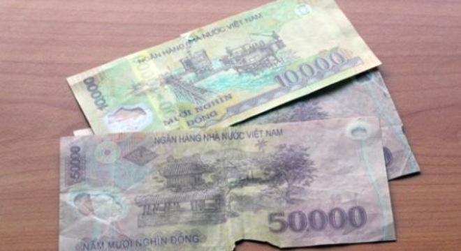  Ngân hàng Nhà nước sẵn sàng đổi tiền cũ, rách cho người dân 